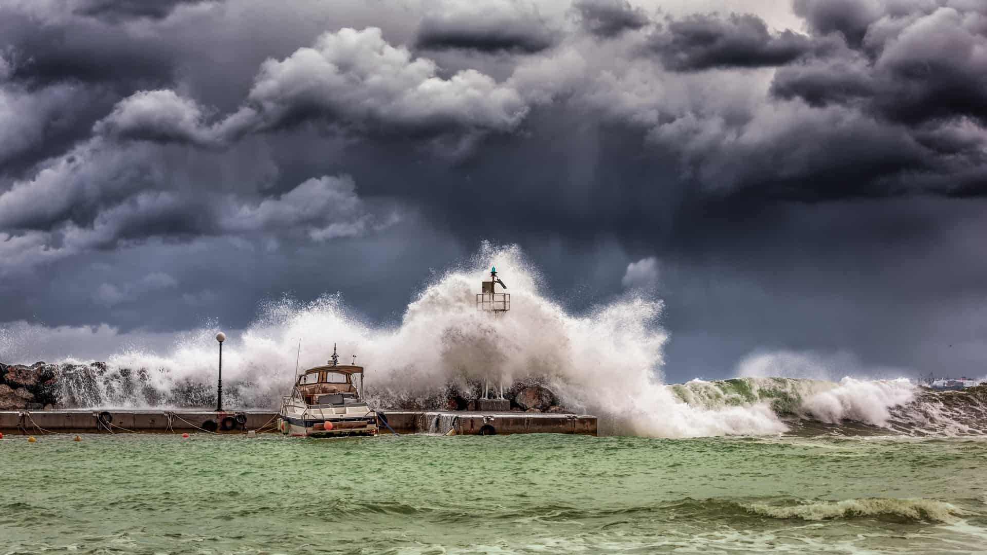 high waves and dark skies travel during hurricane season