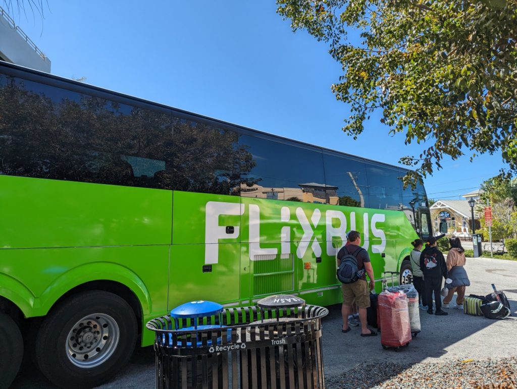green flixbus ready to depart from key west