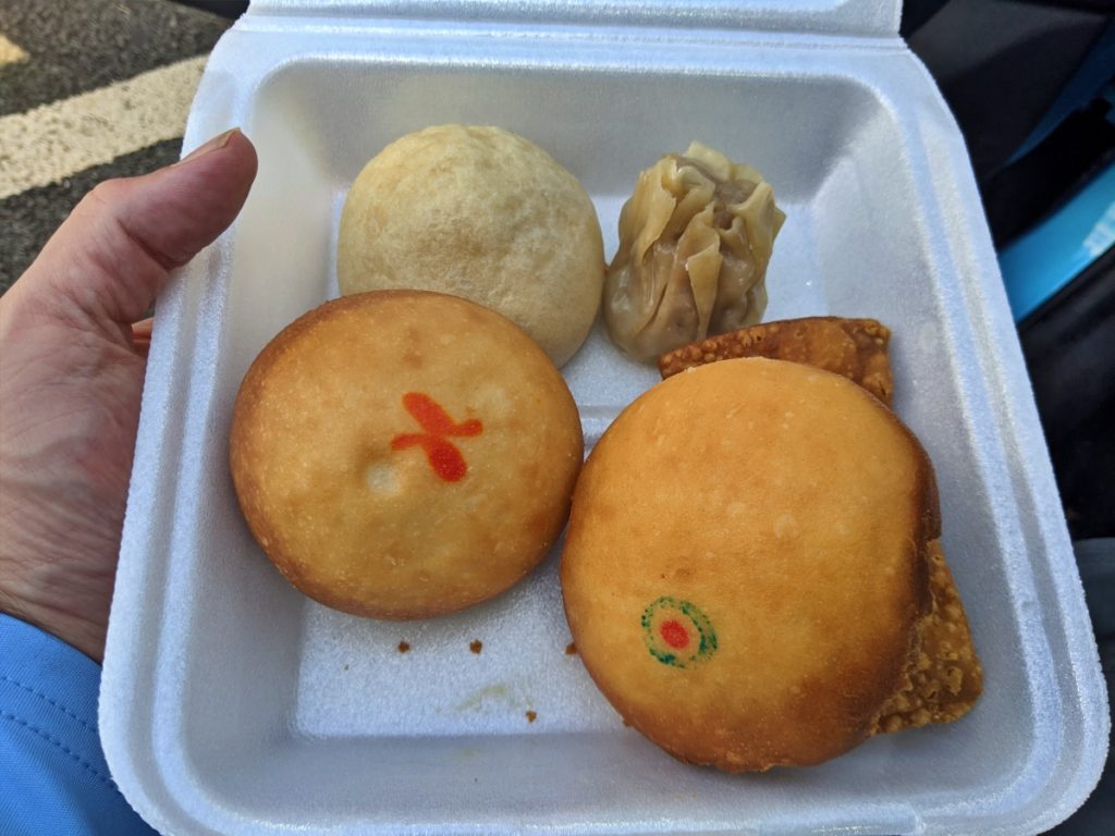 Local food treats in Hawaii. Manapua, pork hash, crispy gau gee